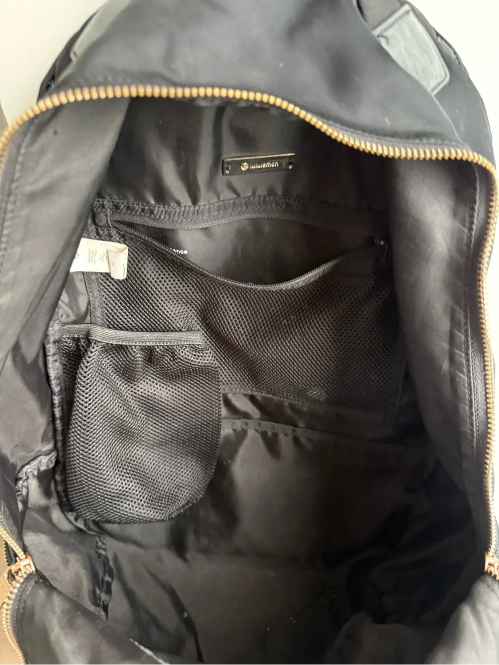 lululemon athletica Black Backpack with Gold Zippers